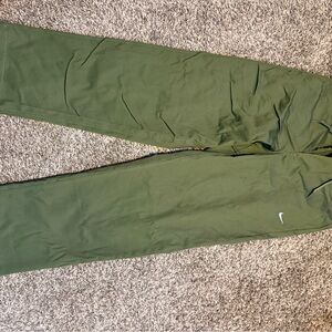 Green Nike twill pants, never worn still has tags on them. Size 30 Medium